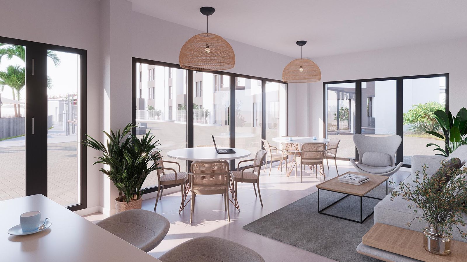 Bright, modern lounge in Mijas featuring designer furniture and outdoor views.