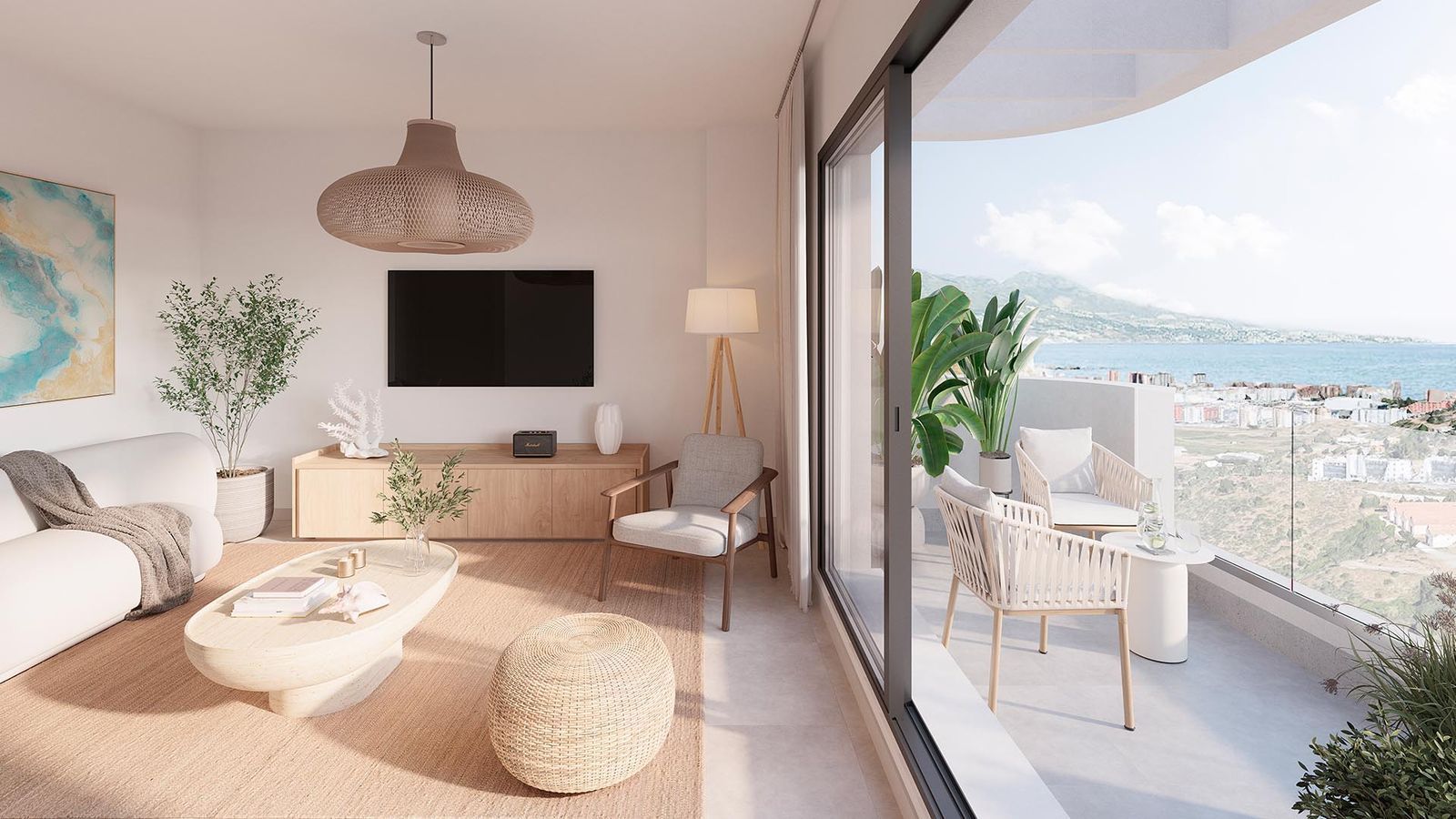 Nowoczesny salon z balkonem i widokiem na morze.